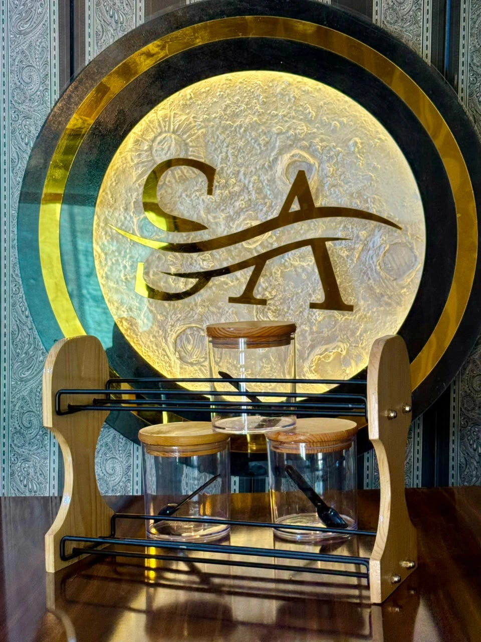 Elegant wooden spice rack displayed in a modern home kitchen with everyday spices