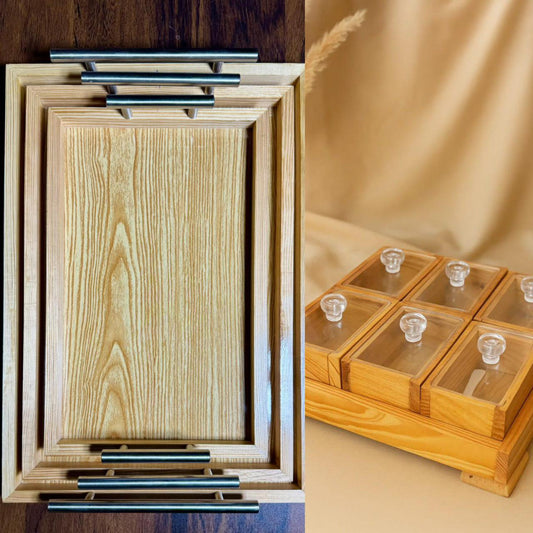 Wooden cutting board with metal handles and a wooden jewelry box with glass panels.